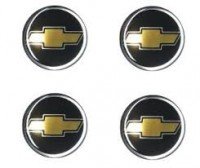 EMBLEMA CALOTA GM RESINADO DOURADO 55MM=